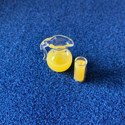 Jug of Orange Juice & Glass